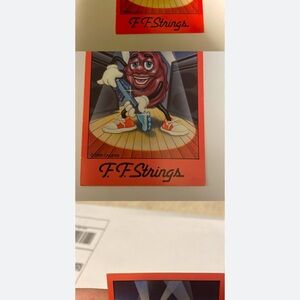 Orange Character Sticker — Playful Guitar Mascot